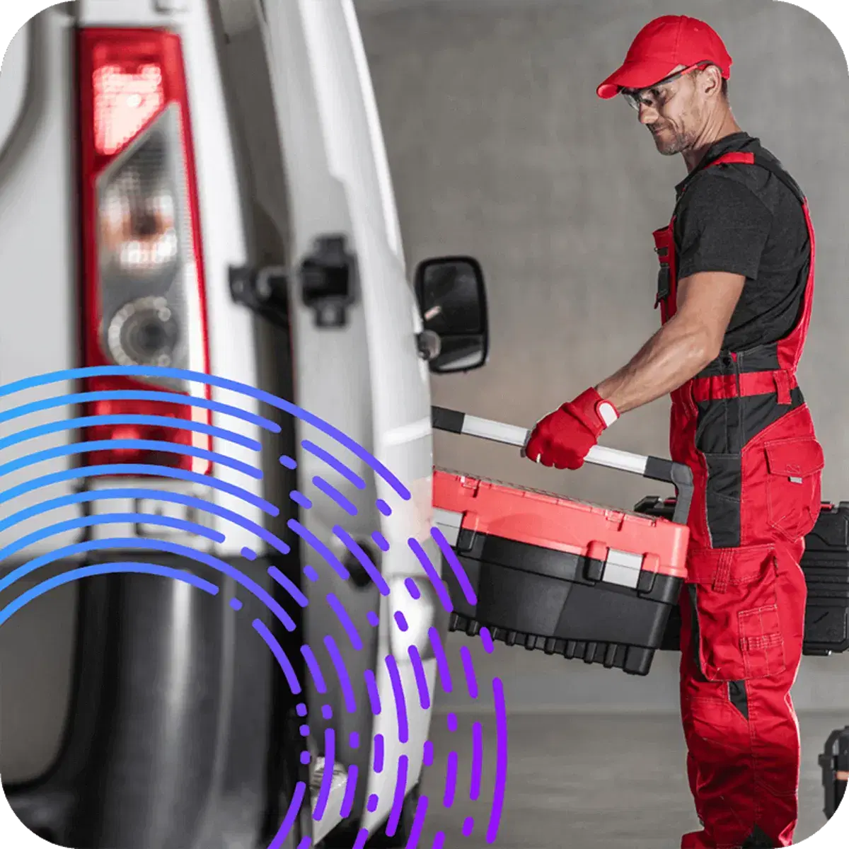 Man loading tools into a van