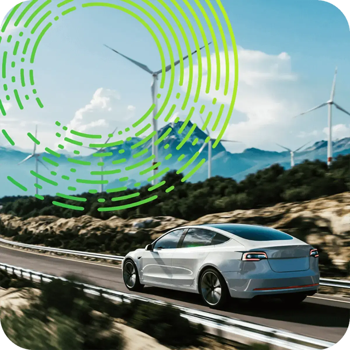 Car driving past a windfarm